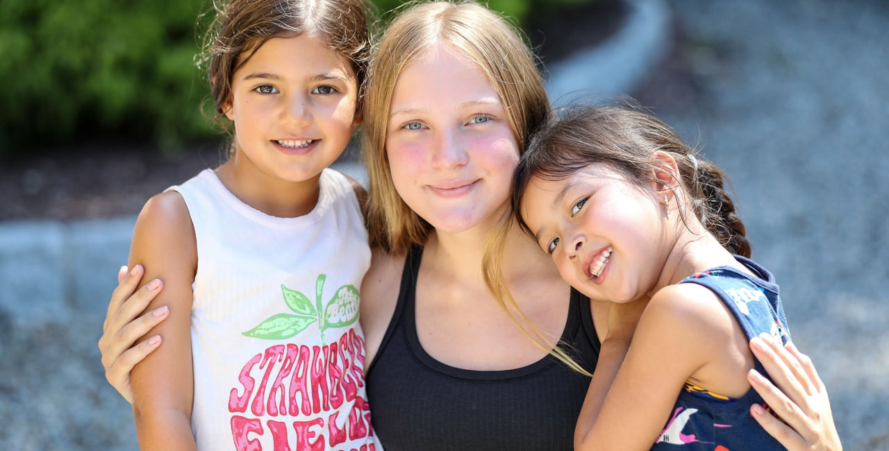 Three Willow Lake campers smiling together
